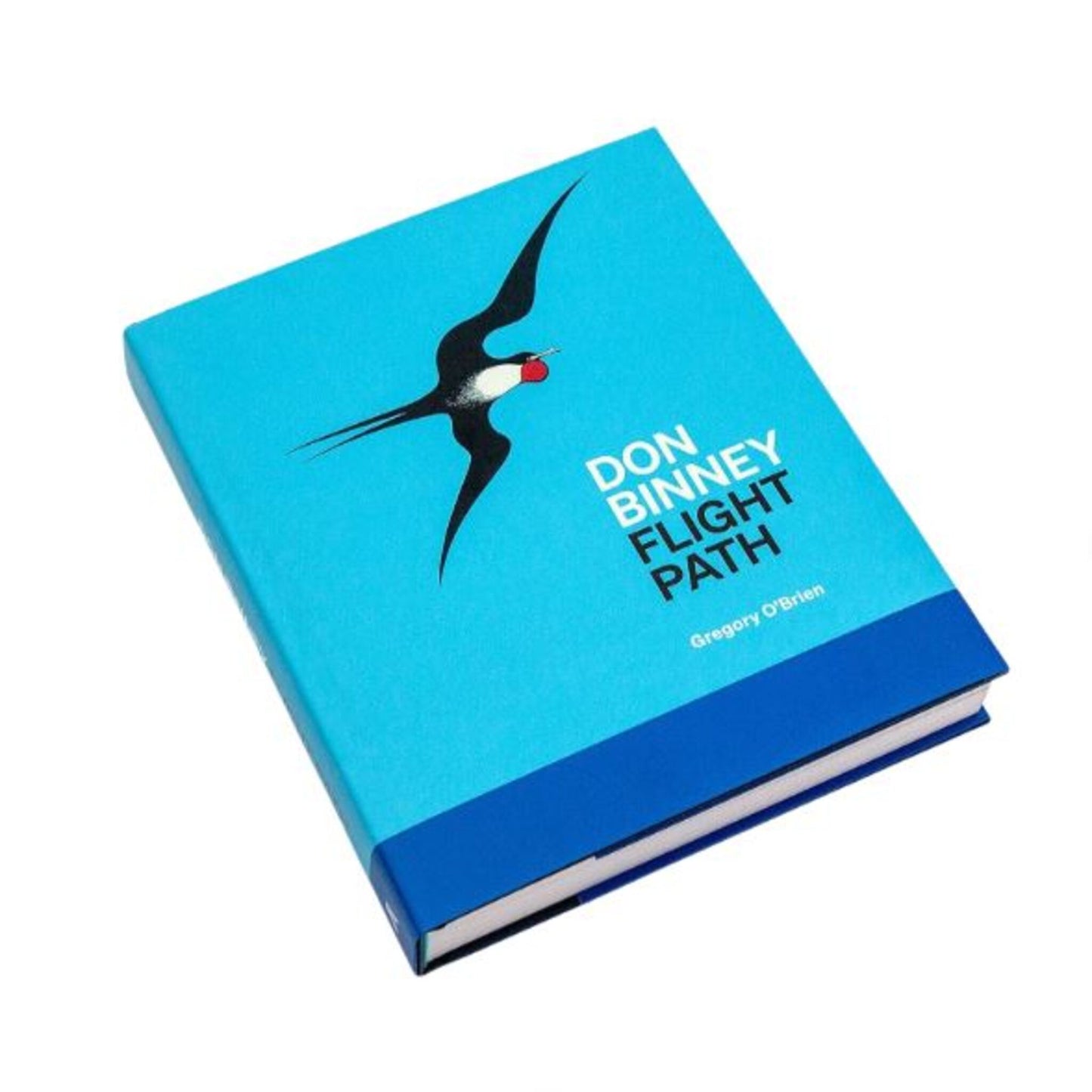 Book with bright blue cover and bird in flight.