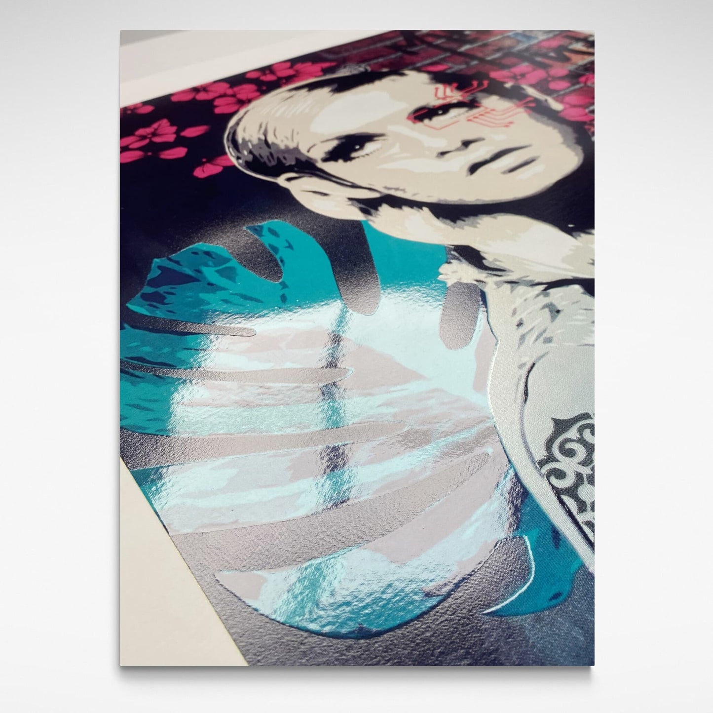 Detail of urban art-style screenprint portrait of Twiggy by Brad Novak. It has 2 x UV gloss embellishment layers.