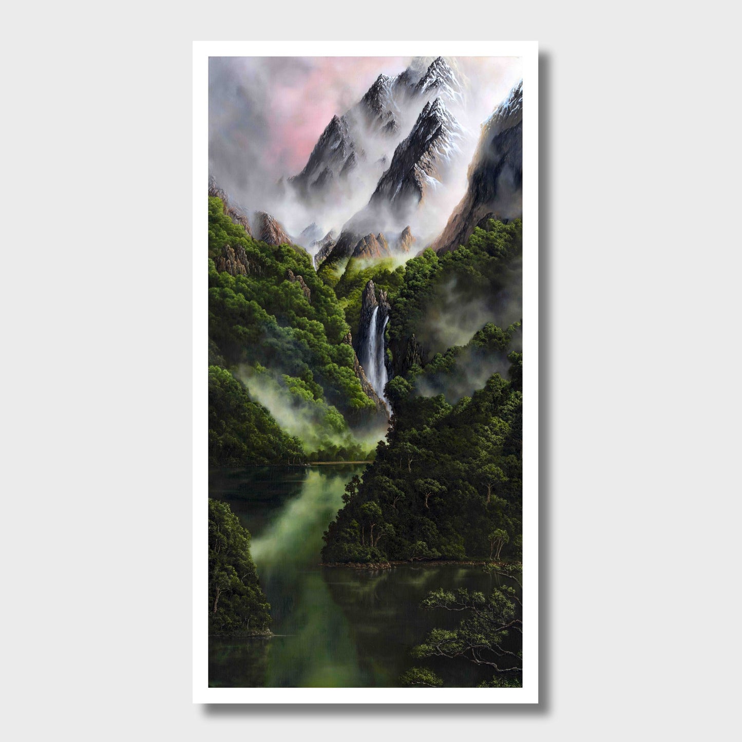 Mountain landscape with a waterfall, misty clouds and lush green vegetation reflected in a serene pool of water