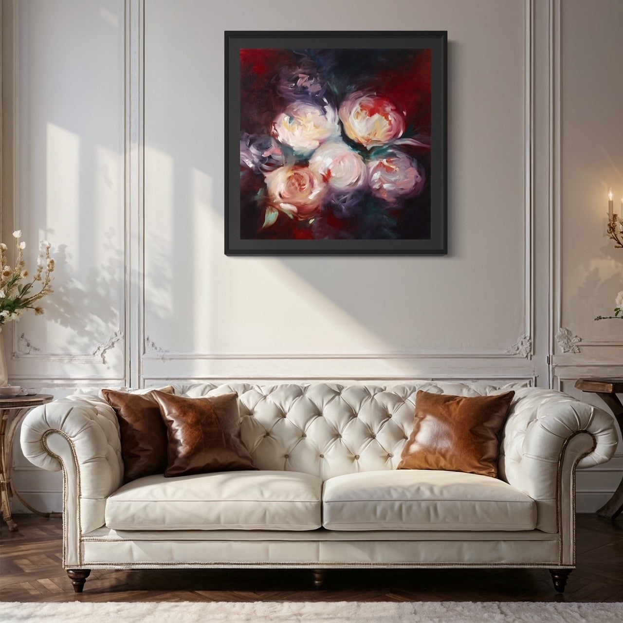 Print of a bouquet of flowers hanging above a sofa