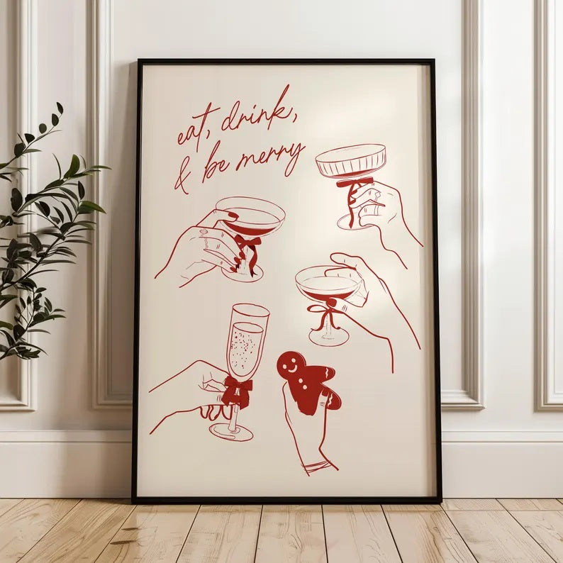 Christmas Drinks print by Solstice Studio Prints, leaning against a white wall, features a festive design that captures the holiday spirit