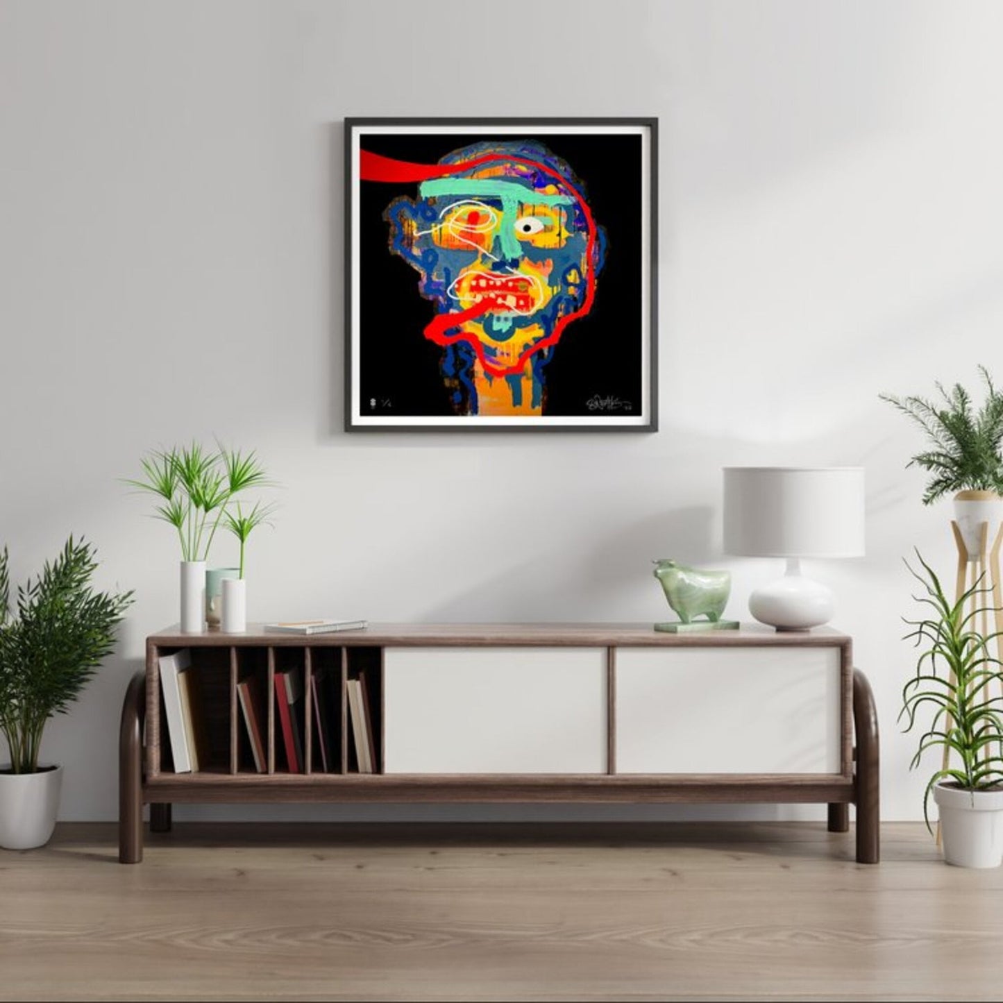Bright abstract portrait of head hanging above a sideboard