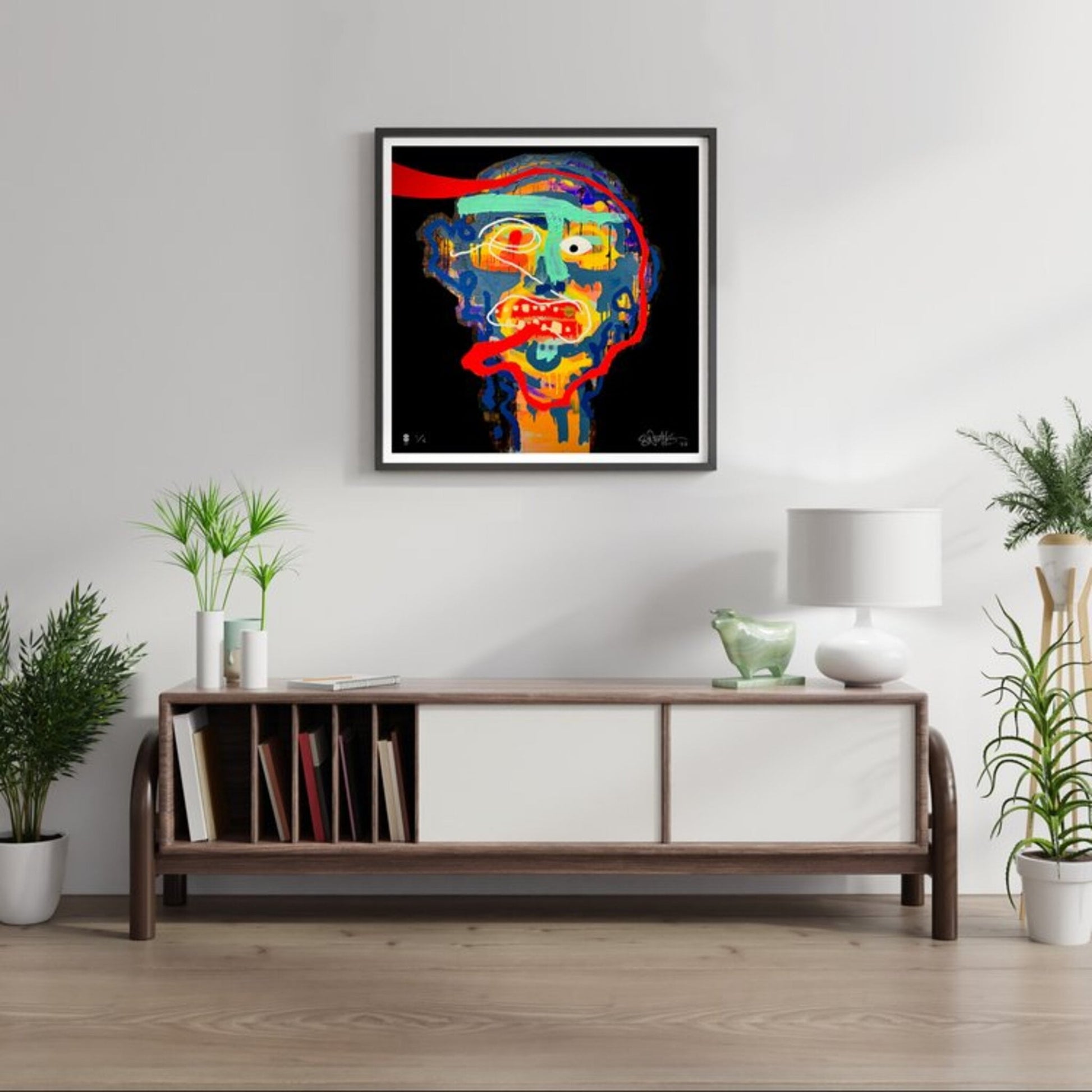 Bright abstract portrait of head hanging above a sideboard