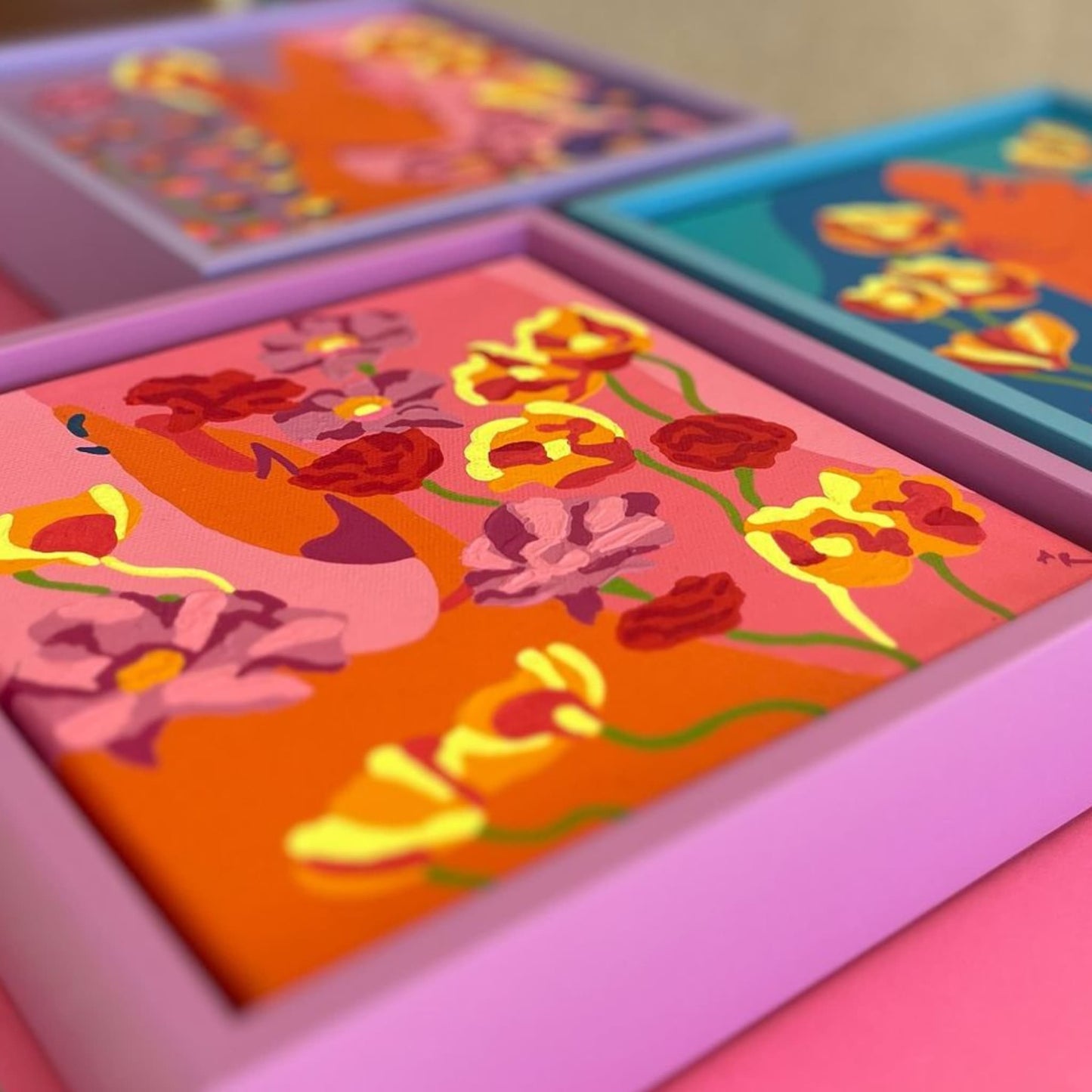 A group of Blossom paintings by Agate Rubene (Restless and Infectious) showcasing their beautiful frames