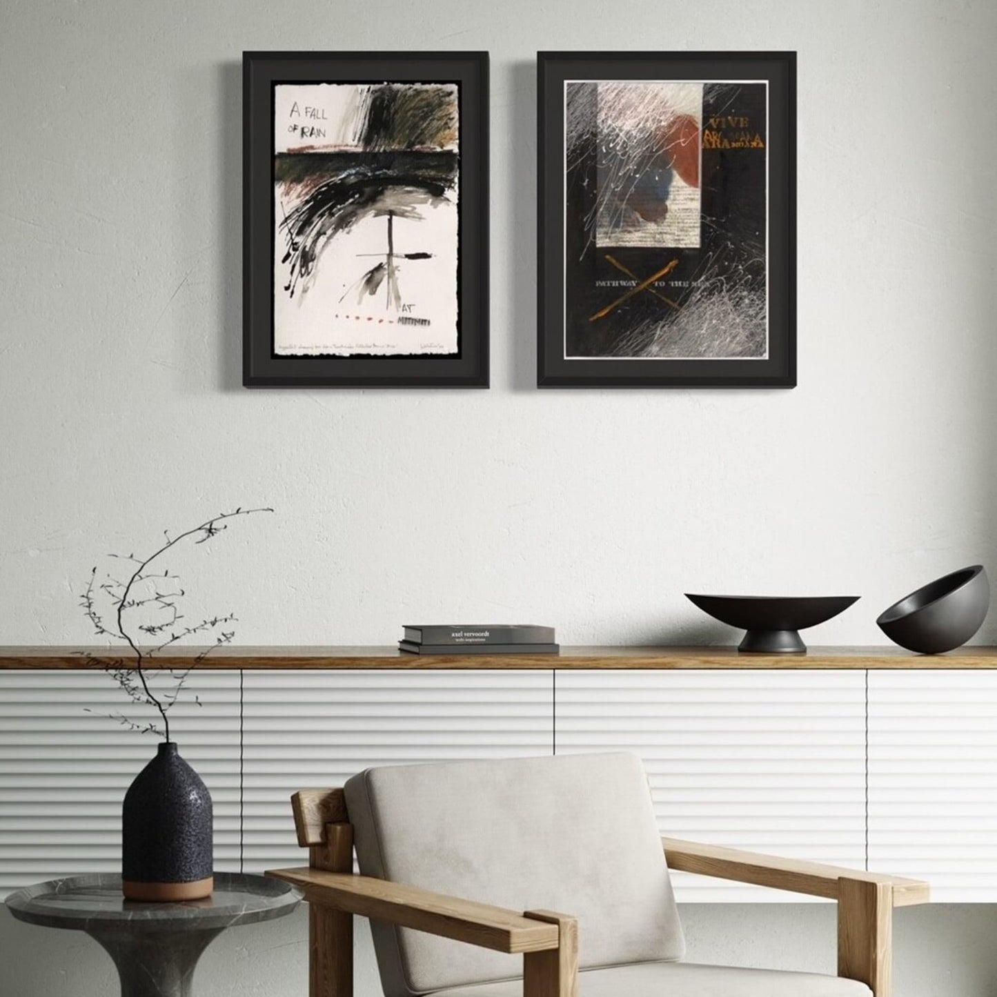 Two Ralph Hotere prints hanging above a sideboard