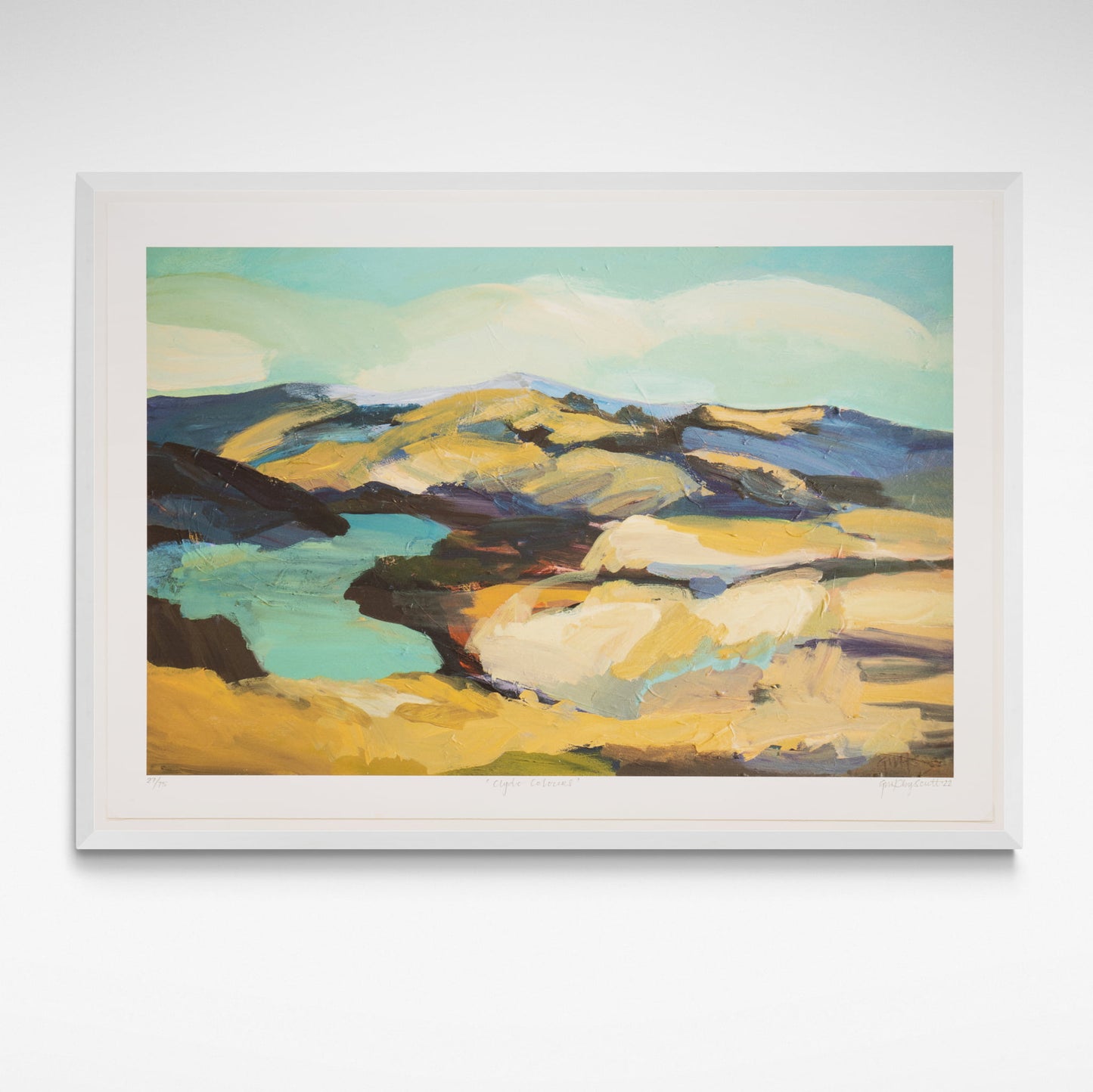 Framed landscape print of yellow hills and the vivid blue Clutha river around Clyde.