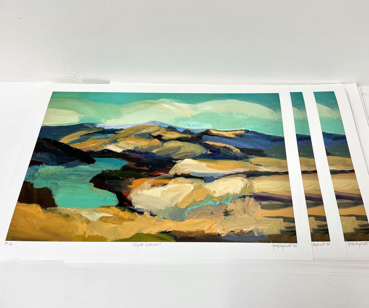 Stacked Clyde Colours prints.