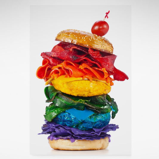 A vibrant photographic print of a rainbow-coloured burger from Henry Hargreaves' *Food of the Rainbow* series, showcasing bold colours and playful creativity.