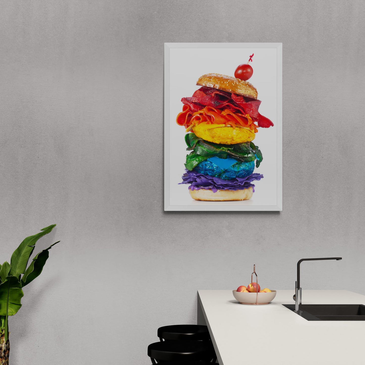 A framed photographic print of a rainbow-coloured burger from Henry Hargreaves' *Food of the Rainbow* series hanging on wall in kitchen,