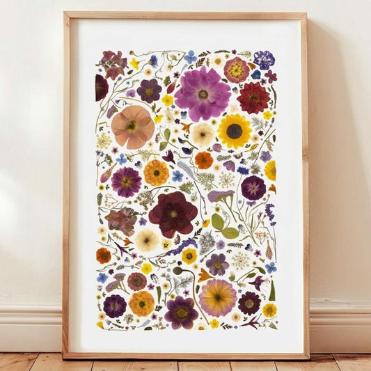 Colourful, botanical artwork made from pressed flowers, arranged with precise, detailed placement.