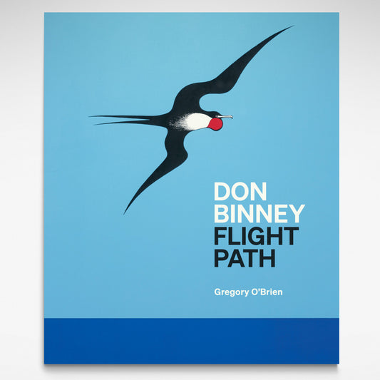 Book with bright blue cover and bird in flight.