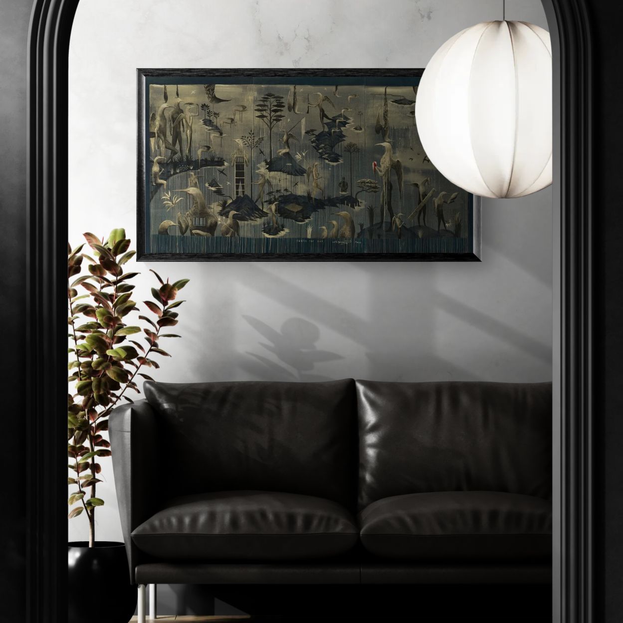 Framed Bill Hammond art print displayed above a sofa, depicting a surreal landscape of birds, trees and architectural forms in muted grey, brown and black tones.