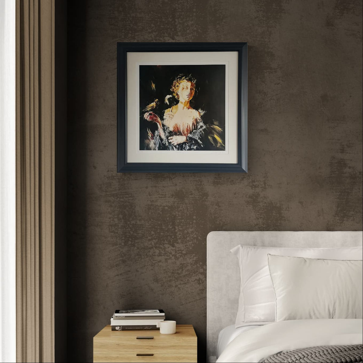 A framed art print "Reckoning" by Justine Turnbull, featuring an impressionistic painting of a woman with birds, set in a black frame with an off-white mat border, displayed on a textured dark brown wall above a bed with white bedding and a light wood bedside table.