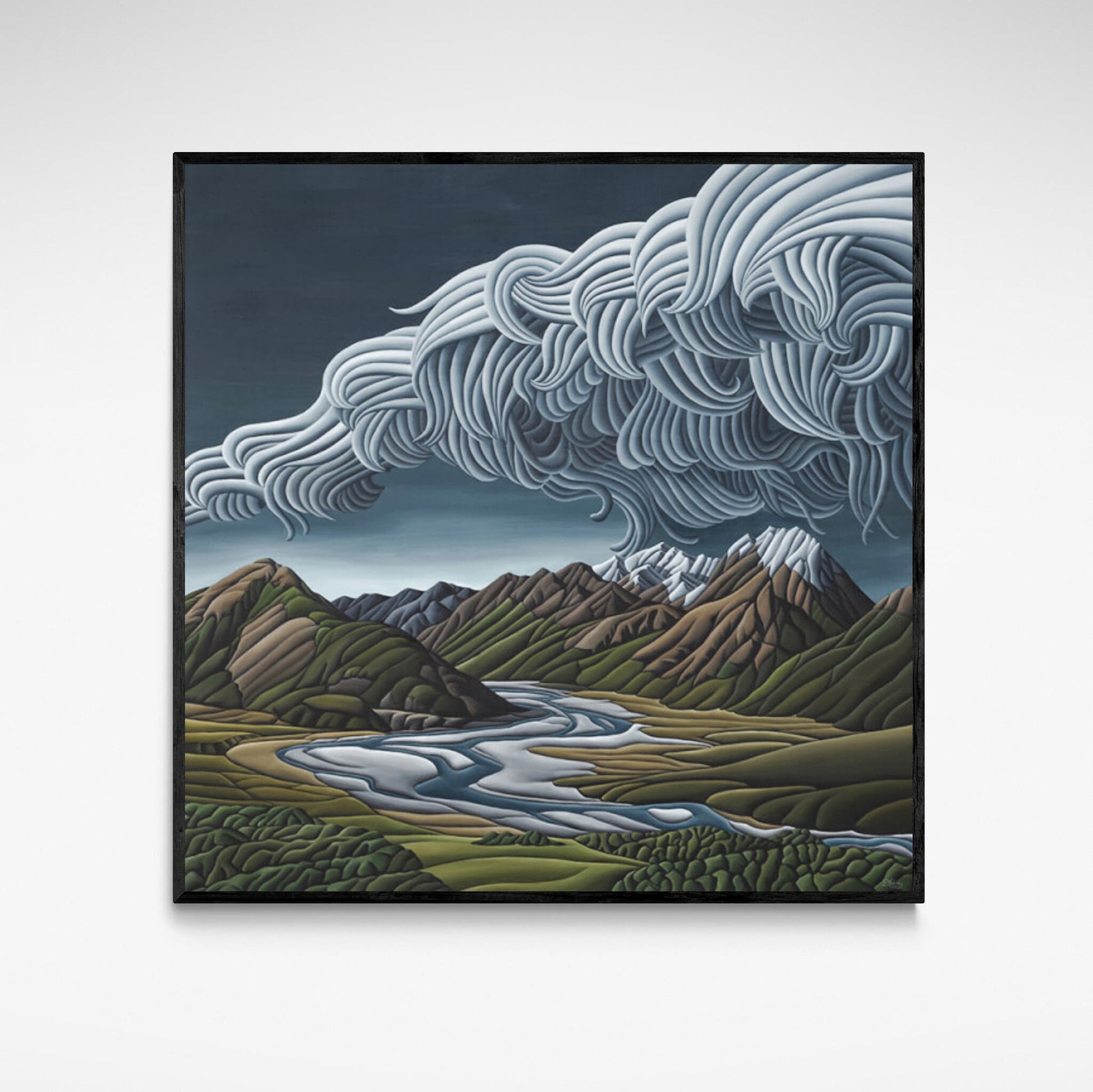 Framed Diana Adams print depicting storm clouds over mountains and river valley