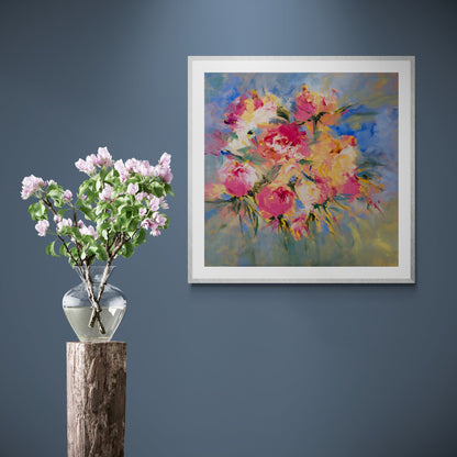 A hanging print of bright coloured flowers