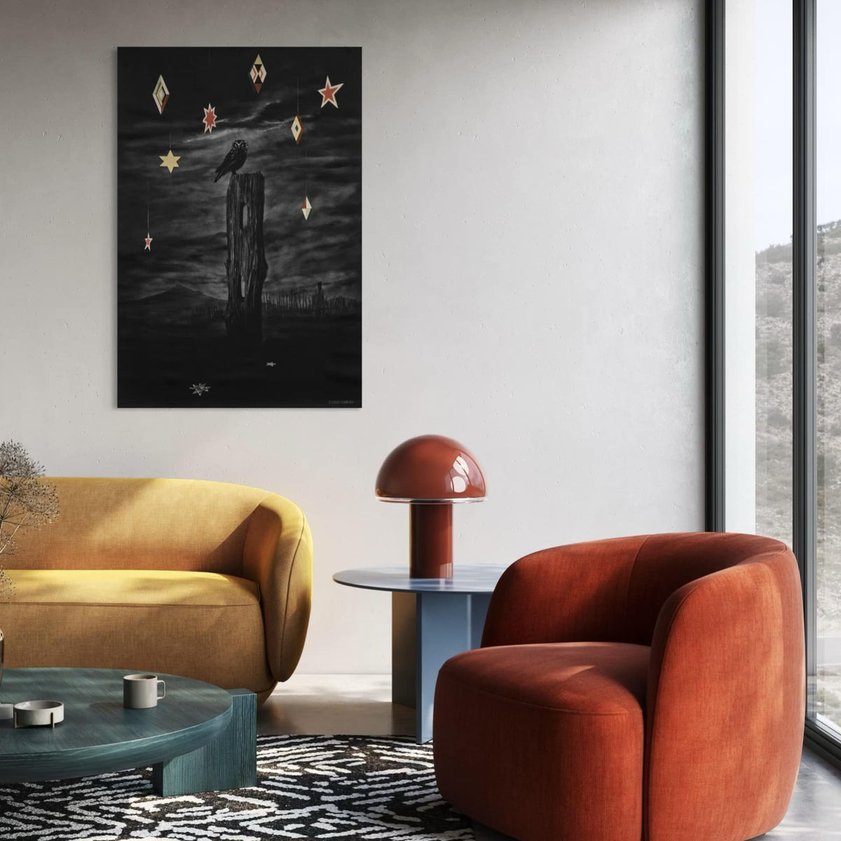 Nocturnal by Paula Coulthard, showing a black ruru perched on a weathered wooden post against a cloudy night sky, hanging on a neutral wall with colourful furniture.