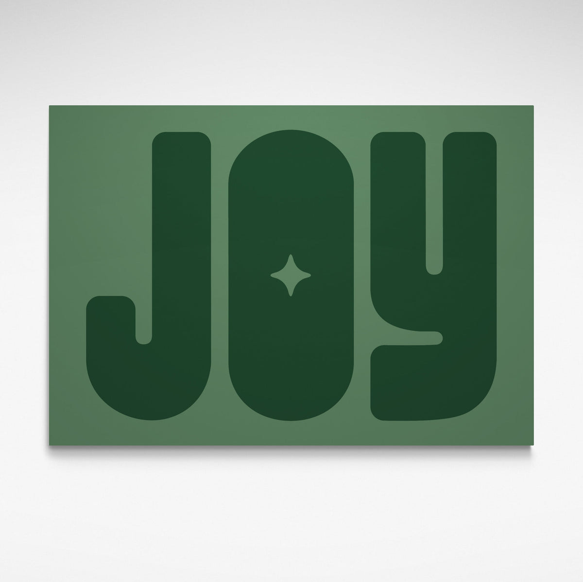 Solstice Studio Prints art print featuring the word 'JOY' in large, bold, dark green retro-style letters on a muted sage green background.