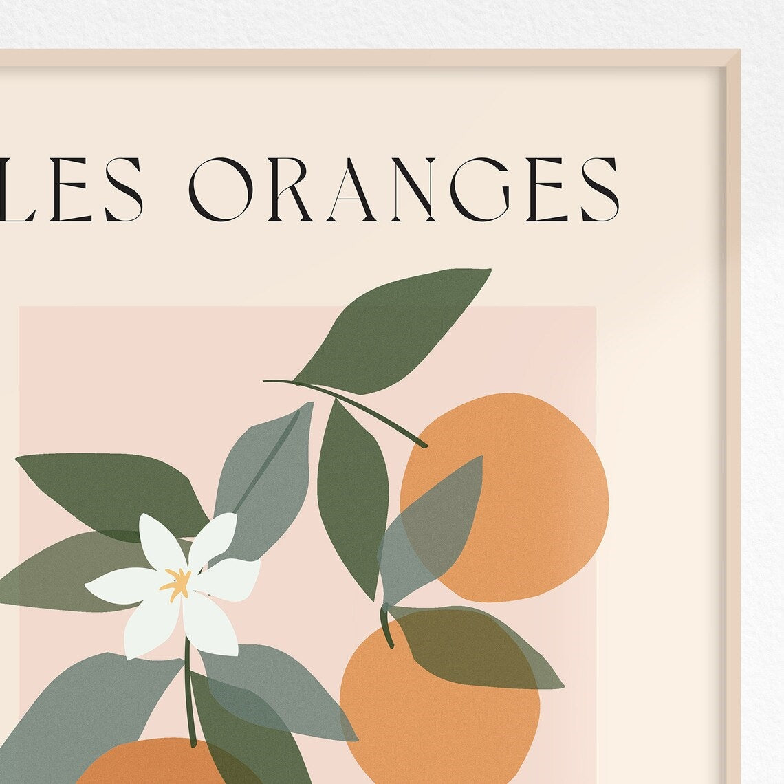 Close up of framed print of oranges, green leaves and blossom
