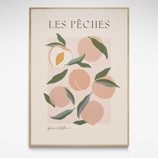 Framed print of peaches with green leaves.