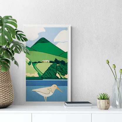 Print of a seabird on harbour with hill in the background sitting on sideboard