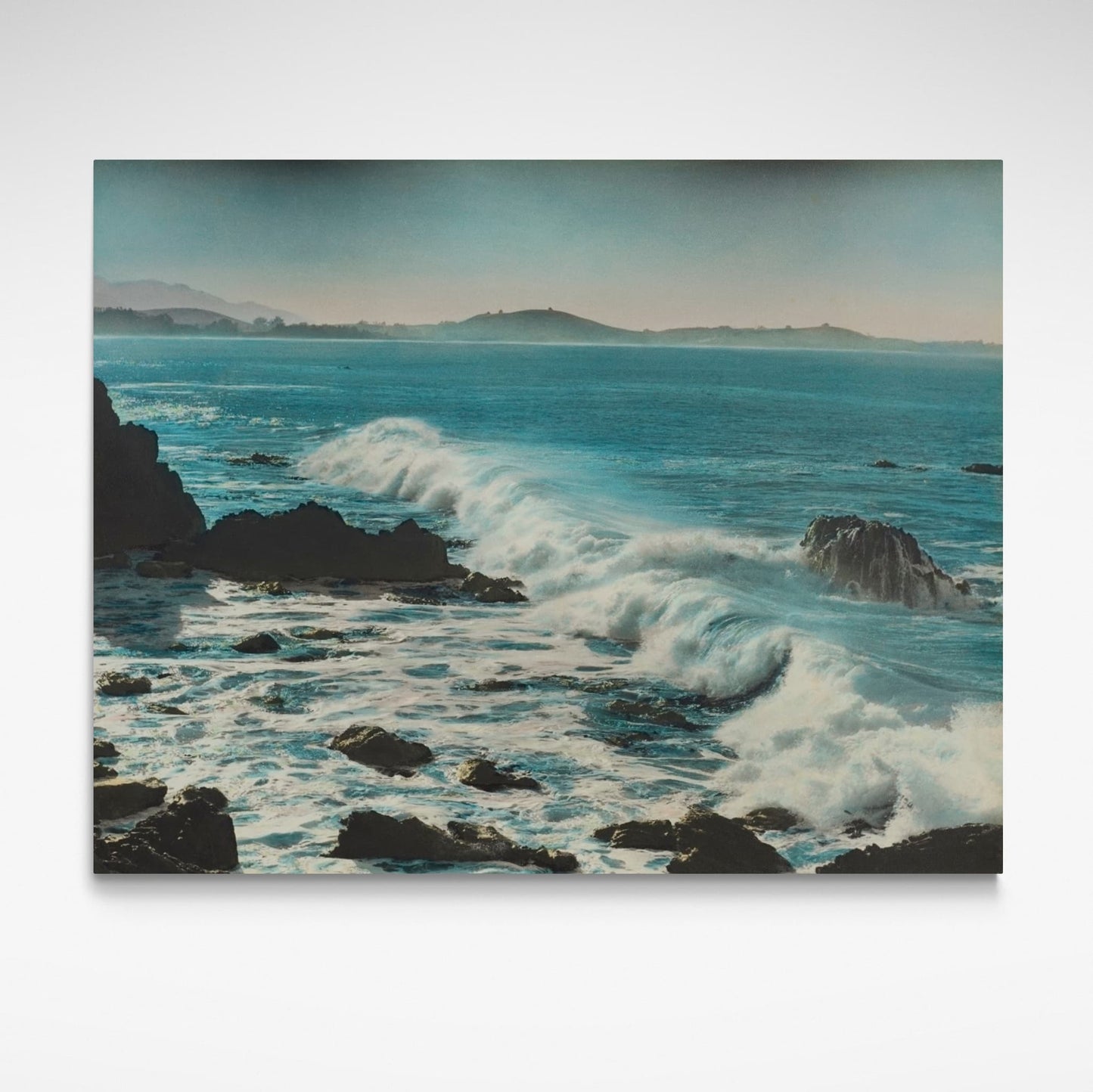 Print of waves breaking on rocky coastline.