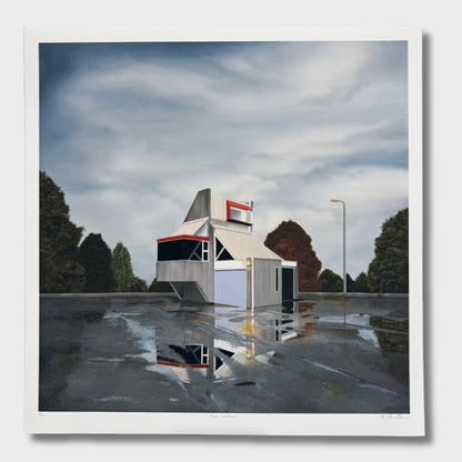 Reflective wet surface with a small abandoned building structure and trees in the background