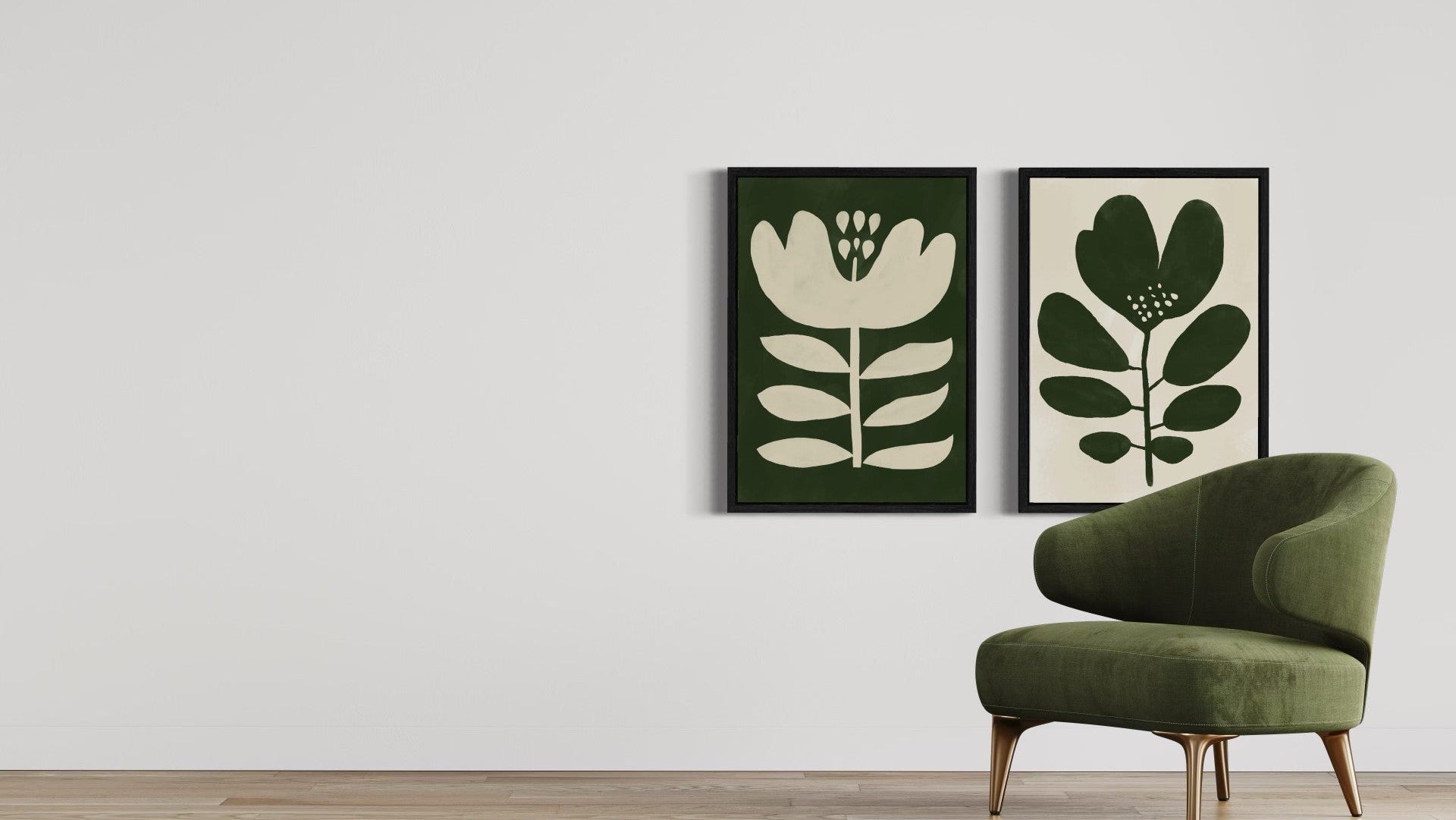 Green armchair in front of two framed botanical prints on a white wall.