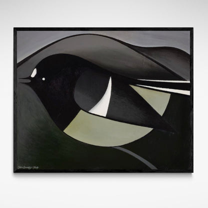 Large bird against dark grey and black mountains