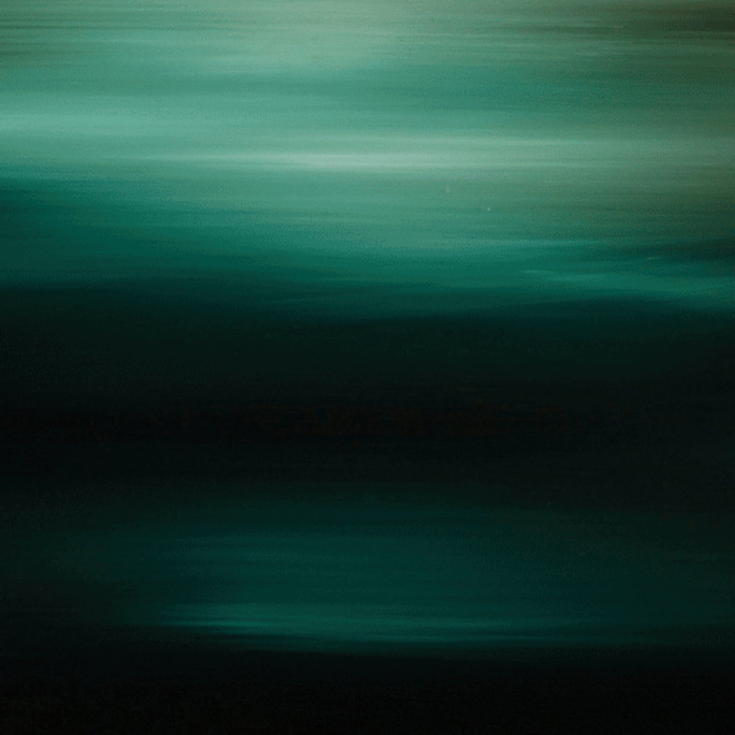 Close up of moody landscape of greens and white cloudy coastal horizon.